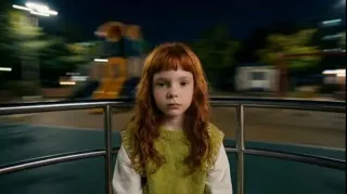 旋转游乐场轮盘上的忧郁主题